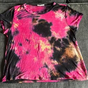 Colorful cute shirt being sold.